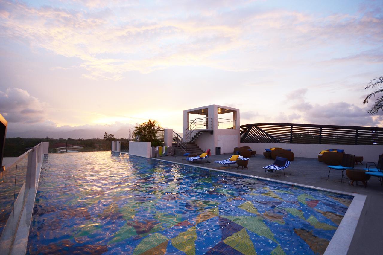 เว้ โฮเต็ล แอนด์ รีสอร์ต ปวยร์โต ปรินเซซา แมเนจ บาย เอชไอไอ Hotel Puerto Princesa ภายนอก รูปภาพ